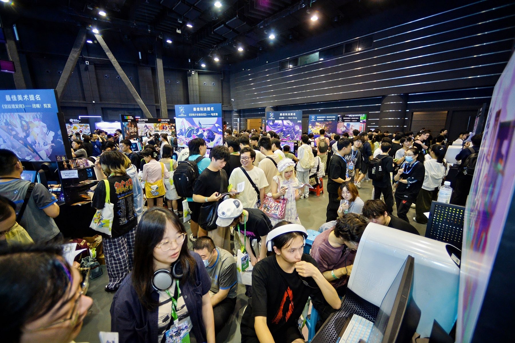 Attendees trying games